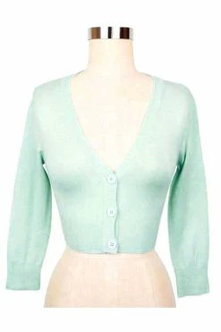 MAK Sweaters Cropped Cardigan With 3/4 Sleeves In Ice Blue 13 MAK Sweaters Cropped Cardigan With 3/4 Sleeves In Ice Blue -Collectif Shop CropLS ICB F cf84267e 0c4c 413c 9bd6 464d14c59ff6 560x